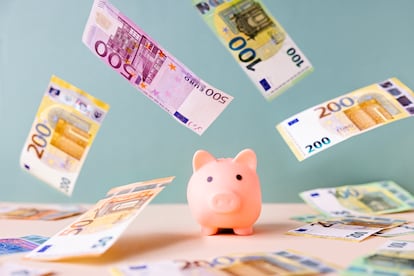 Piggy bank and falling European Union currency