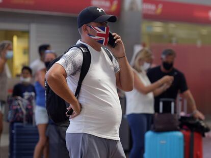 A traveler in Tenerife airport on July 26.