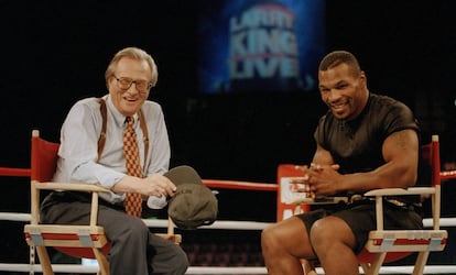 Larry KIng y Mike Tyson, en 1995.
