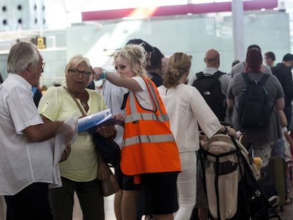 Staff at Barcelona airport direct passengers this week.