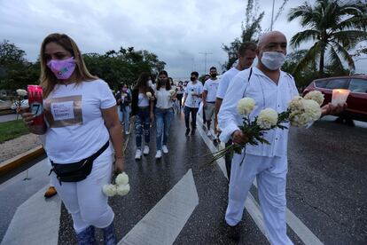 Manifestantes en la marcha por la paz del pasado 11 de noviembre tras la brutal represión de la policía en Cancún, México.