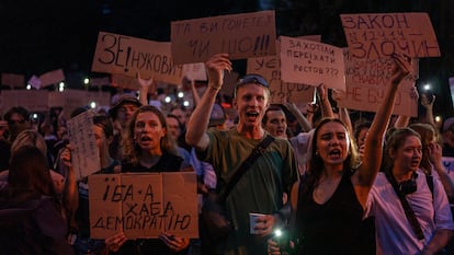 Protesters demonstrate in Kyiv Tuesday against measures promoted by the Zelenskiy government.