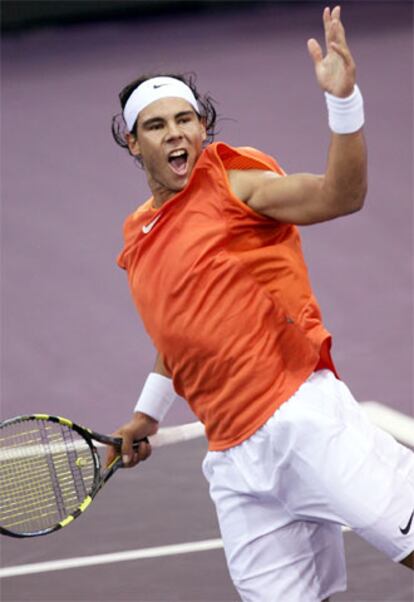 Nadal celebra su victoria sobre Ginepri.