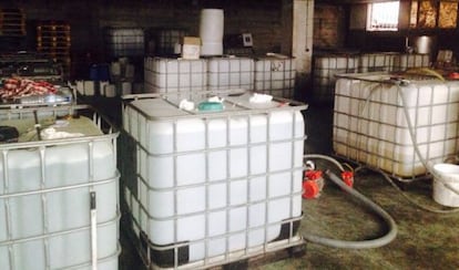 Plastic vats filled with alcohol in en Maside (Ourense)