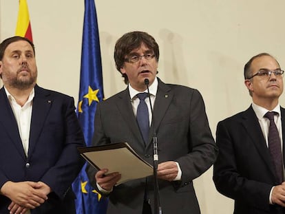 Jordi Turull, a la dreta, amb Puigdemont i Junqueras.