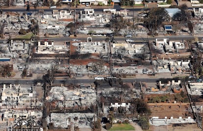 In an aerial view, homes and businesses are seen that were destroyed by a wildfire on August 11, 2023 in Lahaina, Hawaii.