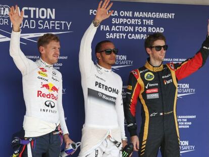 Hamilton, Vettel y Grosjean saludan tras la clasificación