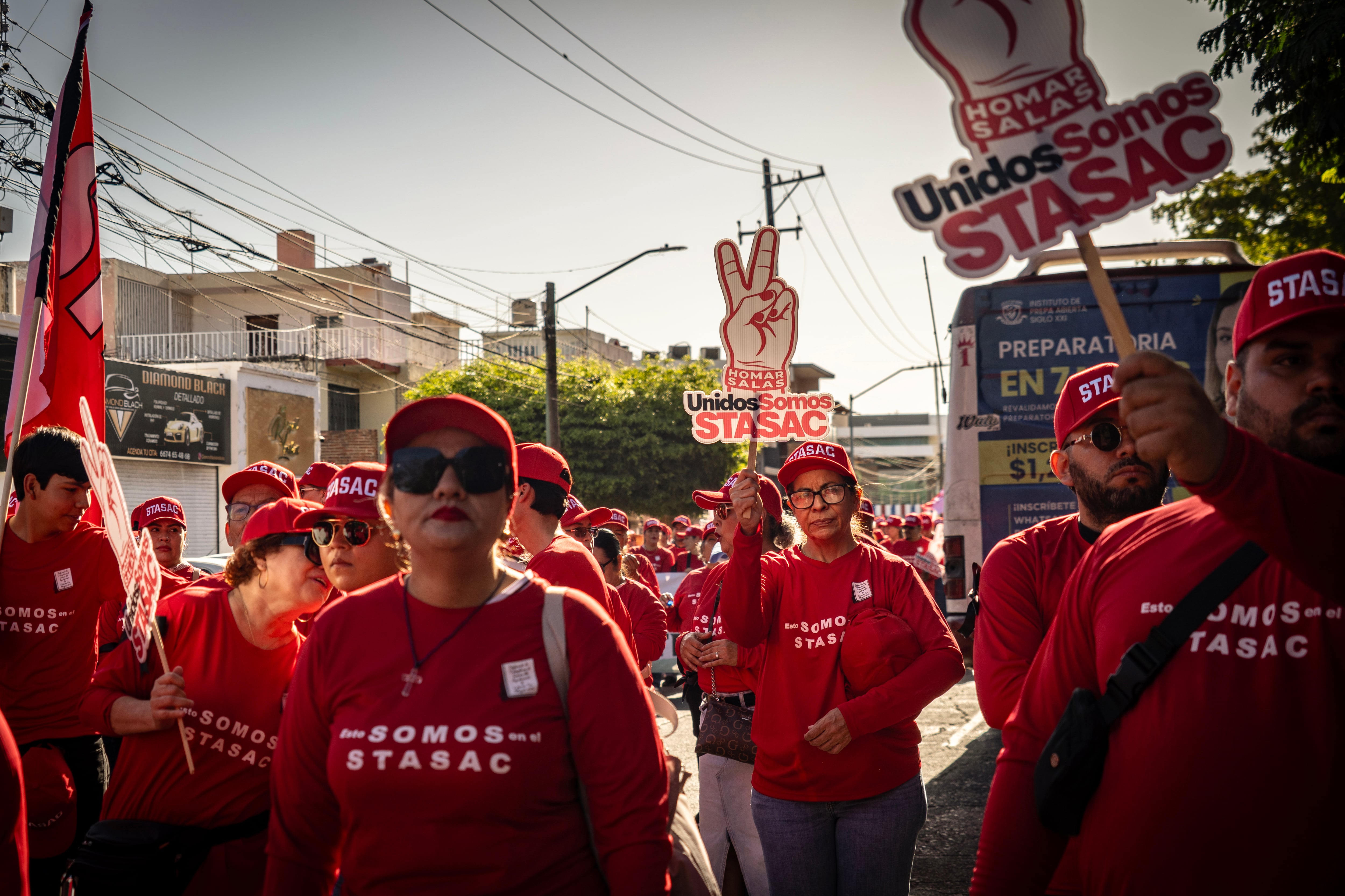 Miembros del Sindicato participan en la marcha del Día del Trabajo en memoria Homar Salas, el 1 de mayo.