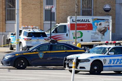 Police vehicles surround a truck that was stopped and the driver arrested, Monday, Feb. 13, 2023, in New York.