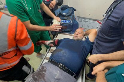 Al Jazeera correspondent Wael al Dahdouh is treated in a Gaza hospital after being injured during an Israeli attack on December 15.