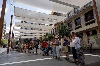 Some of the awnings that have been installed in the streets of downtown Seville to create more shaded areas.