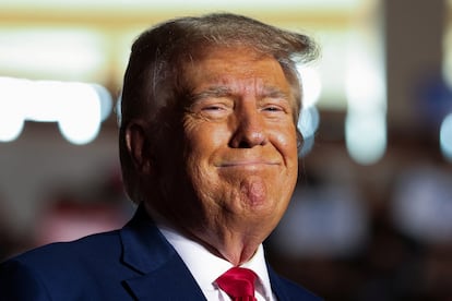 Former U.S. President and Republican presidential candidate Donald Trump reacts as he holds a campaign rally in Erie, Pennsylvania, U.S., July 29, 2023. 