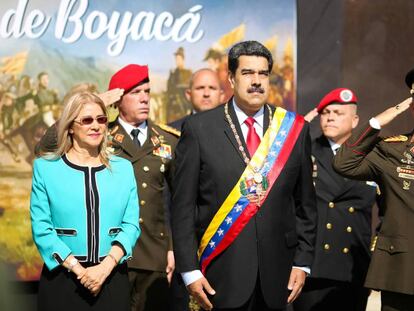Nicolás Maduro, este miércoles en Caracas, con su esposa Cilia Flores. 
