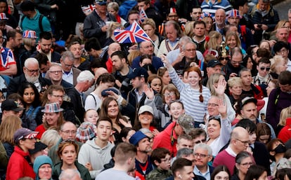 People gather before the coronation of Charles III in London, Saturday May 6, 2023.