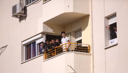 Young men at the apartment run by the non-profit Voluntarios por Otro Mundo.