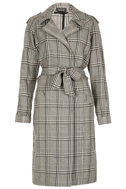 Trench de cuadros de Topshop (110 euros).