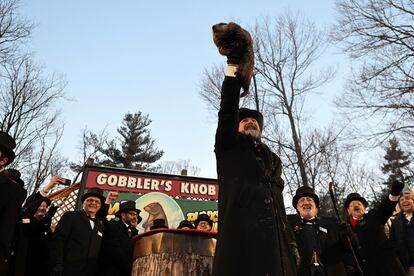 Groundhog Club handler A.J. Dereume holds Punxsutawney Phil, the weather prognosticating groundhog, during the 137th celebration of Groundhog Day on Gobbler's Knob in Punxsutawney, Pa., Thursday, Feb. 2, 2023.