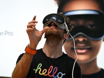 A man tests the Apple Vision Pro augmented reality glasses during the product presentation at the Apple Store in New York, on February 2.