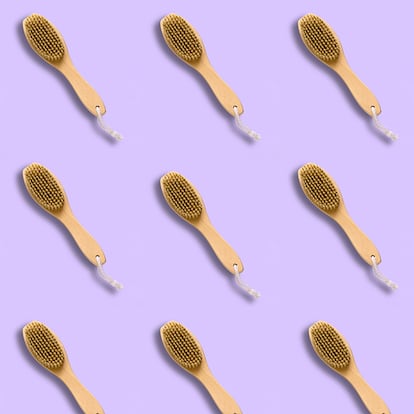 pattern brush for dry skin massage on a pastel violet background