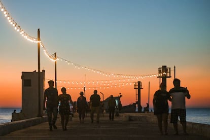Atardecer en el muelle de pescadores de Celestún. Su playa y la reserva de la biosfera de la Ría Celéstun son dos de sus principales atractivos.