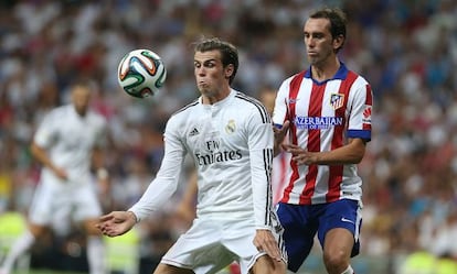 Bale y Godín en la Supercopa.