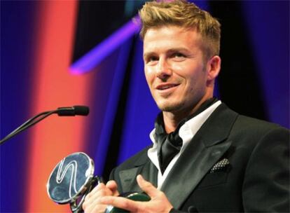 Beckham, recogiendo premio a la difusión del deporte británico