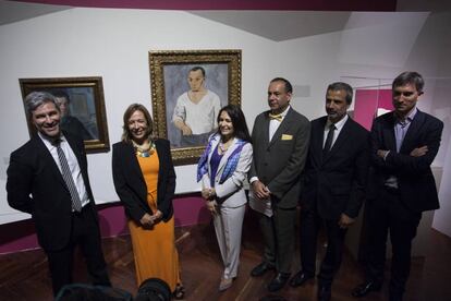 Los curadores y el director del Palacio Nacional durante la inauguración de la muestra