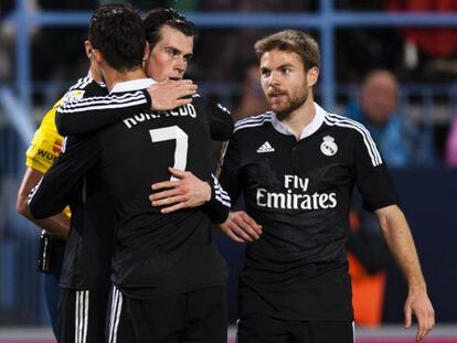 Cristiano, Bale e Illarramendi celebran el segundo gol al Málaga, la semana pasada.