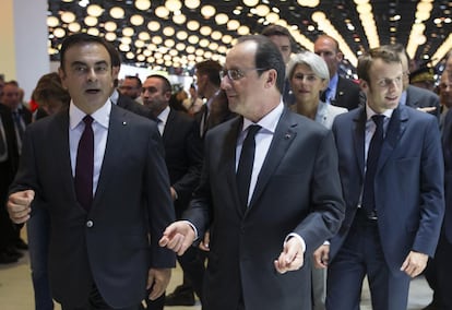 Ghost conversa con el presidente francés de ese momento, François Hollande, en el evento mundial del automóvil en Paris. Atrás de Hollande se encontraba Emmanuel Macron, su ministro de Economía y actual presidente francés.