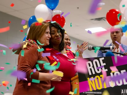 State Sen. Ghazala Hashmi, left, and Lashrecse Aird hug after Aird's victory speech during an election night party in Highland Springs, Va., Tuesday, June 20 2023.