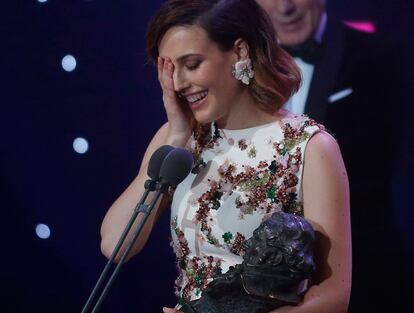 Actress de Molina reacts as he holds his Best Leading Actress trophy during the Spanish Film Academy's Goya Awards ceremony in Madrid
