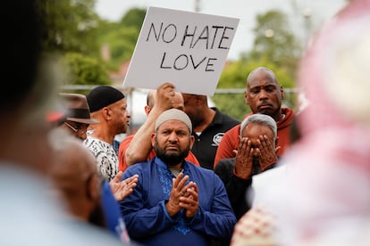 People gathered outside the Tops supermarket in Buffalo in the aftermath of the shooting.