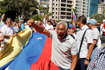 Supporters of opposition coalition presidential hopeful Maria Corina Machado attend her campaign event in Caracas, Venezuela, Tuesday, Jan. 23, 2024