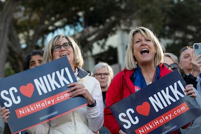 Haley voters with "South Carolina loves Nikki" signs in the coastal town of Beaufort on Wednesday.