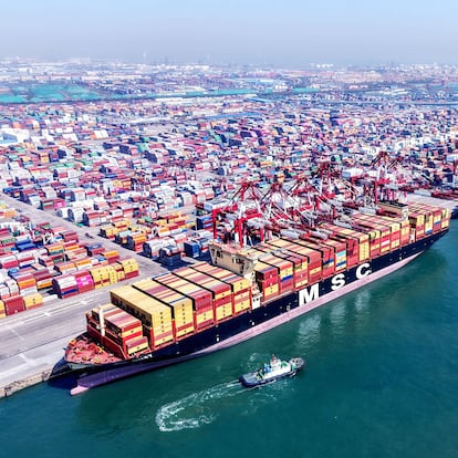 Cargo ships load and unload foreign trade containers at Qingdao Port in Shandong province, China, on April 15, 2025. (Photo by Costfoto/NurPhoto via Getty Images)