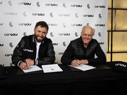 Jon Rahm (left) signing for LIV Golf with league commissioner Greg Norman on December 7 in New York.