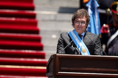 Argentina's President Javier Milei reacts as he gives a speech after his swearing-in ceremony, outside the National Congress, in Buenos Aires, December 10, 2023.