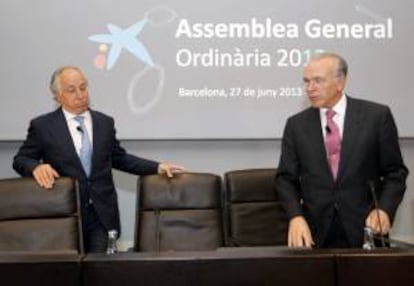 El presidente del grupo La Caixa, Isidre Fainé (d), y su director general, Juan María Nin (i). EFE/Archivo