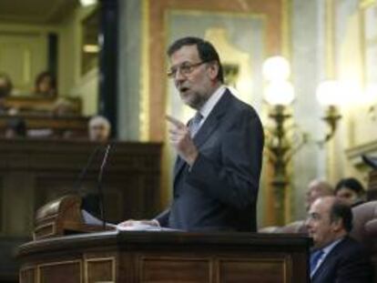 El presidente del Gobierno, Mariano Rajoy, durante su intervención en la sesión de la tarde del debate sobre el estado de la nación que se celebra hoy y mañana en el Congreso de los Diputados.