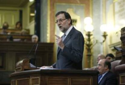 El presidente del Gobierno, Mariano Rajoy, durante su intervención en la sesión de la tarde del debate sobre el estado de la nación que se celebra hoy y mañana en el Congreso de los Diputados.