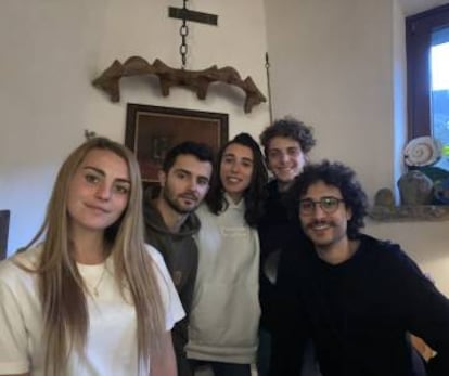 Adrián Fernández (2nd left) in the country house where he has taken refuge. 