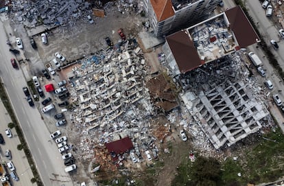 A photo taken with a drone shows a an aerial view over collapsed buildings after an earthquake in Hatay.