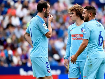 Godín, Griezmann y Koke, el sábado ante el Levante.