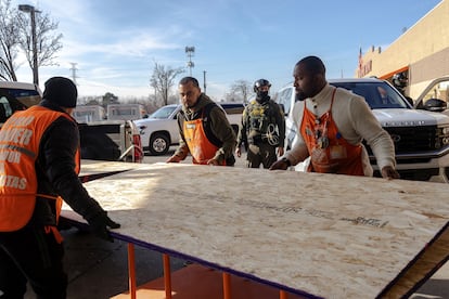 Workers at a Home Depot in Chicago, December 17.