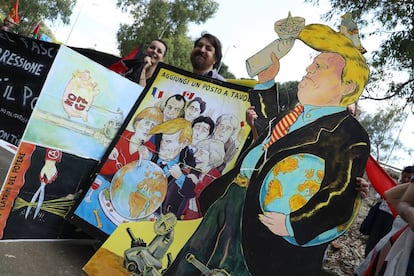 Manifestantes anti Trump ante la cumbre del G7.