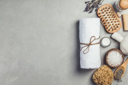 Directly Above View Of Napkin And Products On Table At Spa