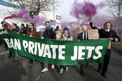 Cimate activist Greta Thunberg, third right, takes part in a march to Farnborough Airport in southern England, Saturday Jan. 27, 2024.