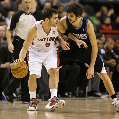 Calderón y Ricky, durante el partido entre Toronto y Minnesota.