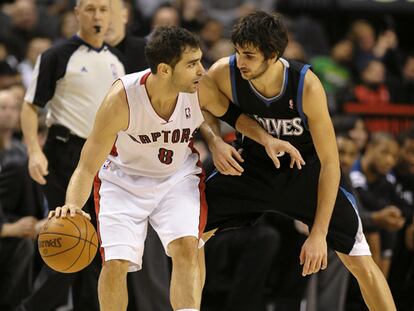 Calderón y Ricky, durante el partido entre Toronto y Minnesota.