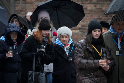 Holocaust survivors and relatives arrive at the Auschwitz Nazi death camp in Oswiecim, Poland, Saturday, Jan. 27, 2024.